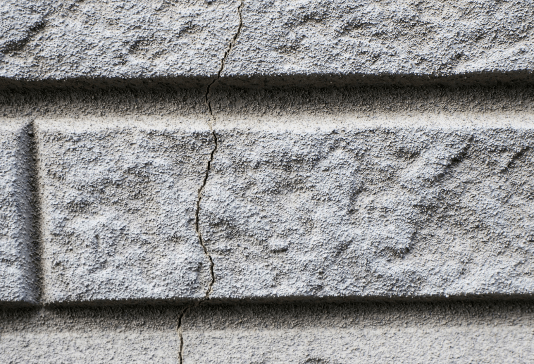 The wall of a home with subsidence, where insurance is needed.