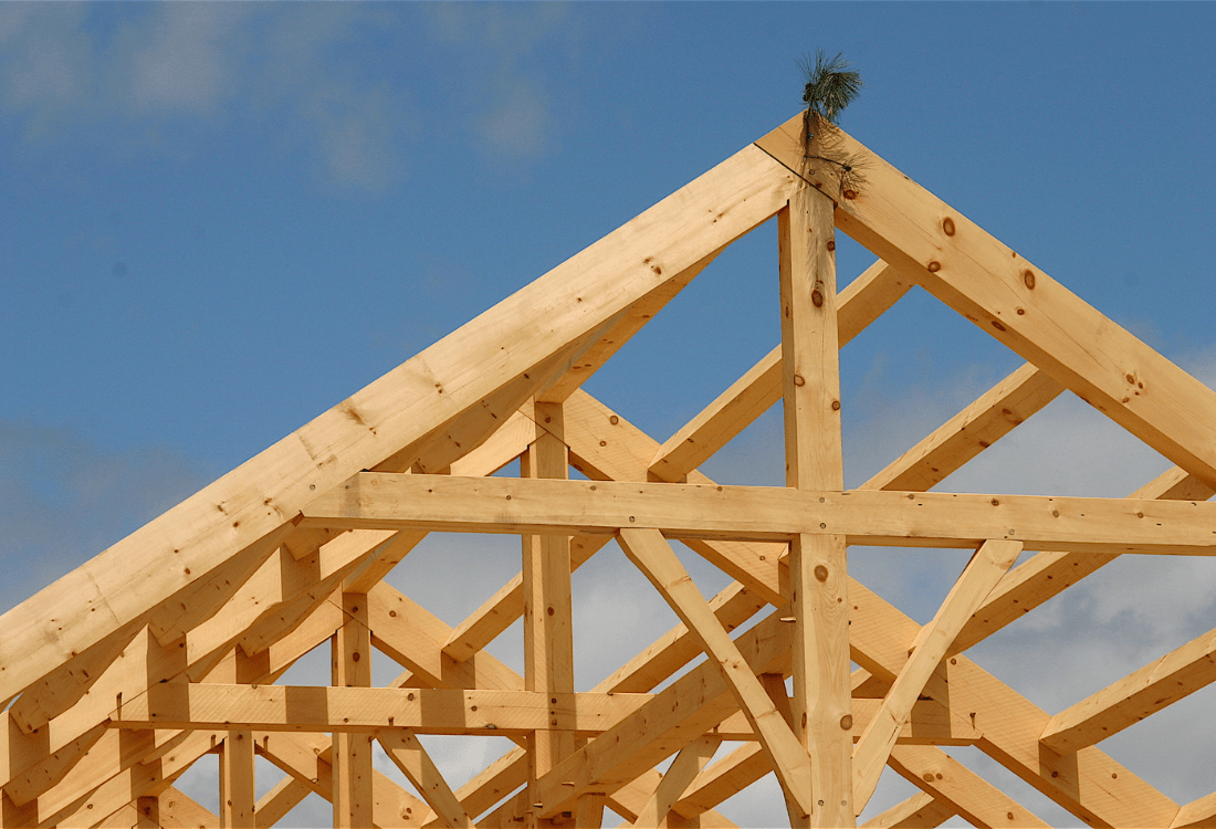 The structure of a timber framed house, which has been insured in case of damages.