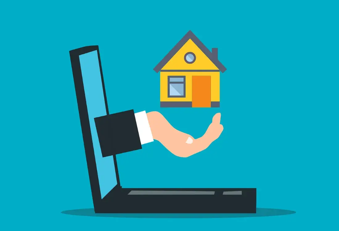 A cartoon hand coming out of a laptop screen which is holding a house to protect from rental risks